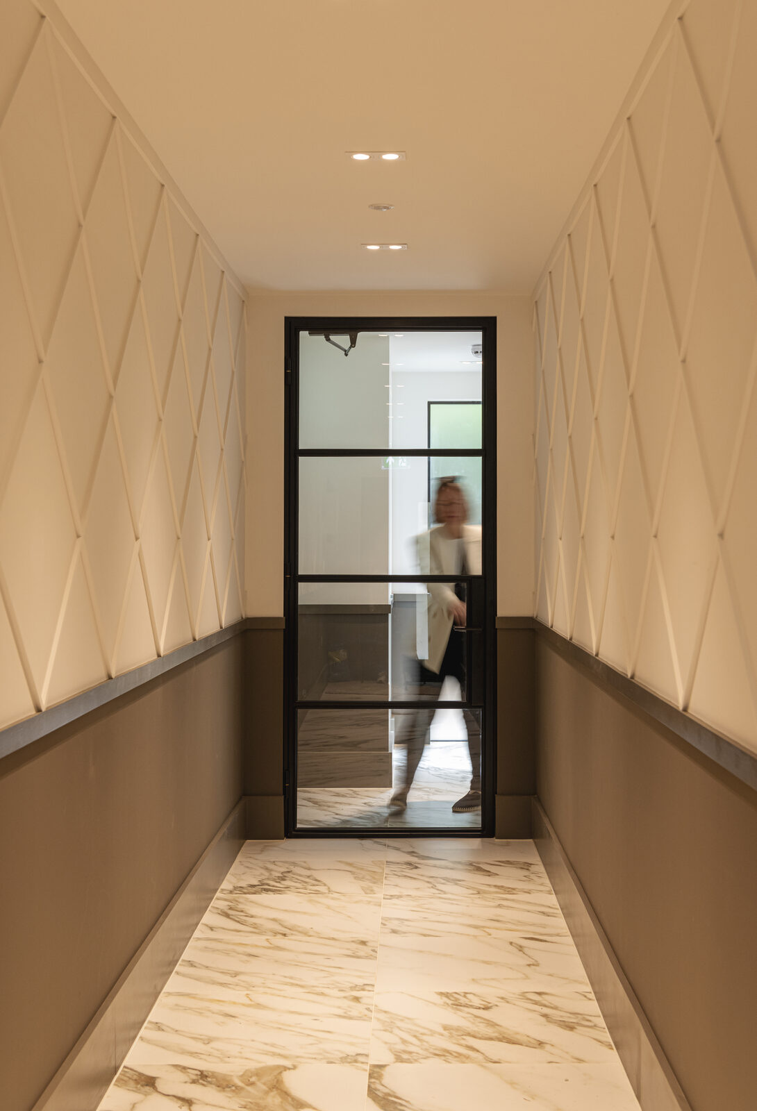 Ivy Gardens entrance hallway with diamond panelling, marble flooring and crittal glazing