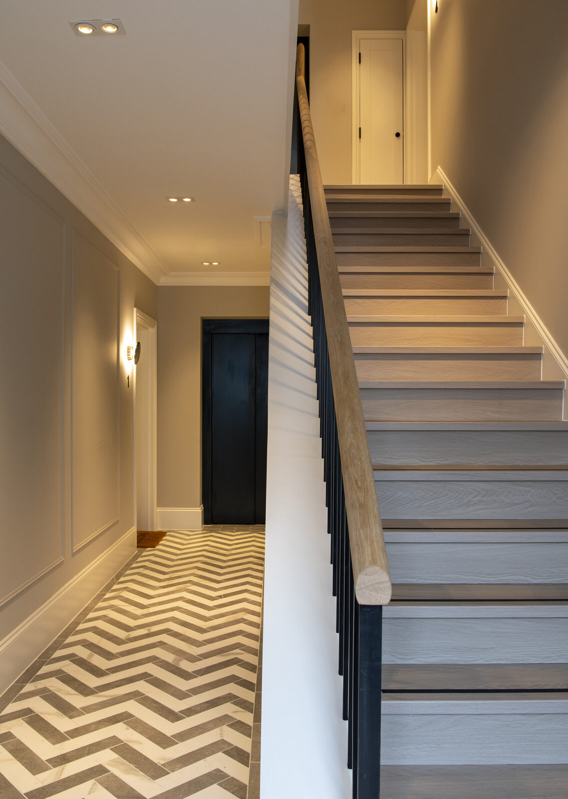 The Rosemont entrance with chevron flooring, wall panelling and considered lighting